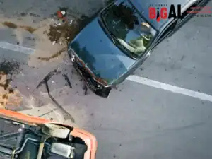 Overhead view of two crashed cars at an intersection